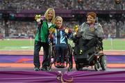 7 September 2012; Ireland's Catherine O’Neill, from New Ross, Co. Wexford, on the podium with gold medalist Josie Pearson, Great Britain, centre, and bronze medalist Zena Cole, USA, after winning silver in the women's discus throw - F51 final. London 2012 Paralympic Games, Athletics, Olympic Stadium, Olympic Park, Stratford, London, England. Picture credit: Brian Lawless / SPORTSFILE