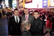 15 November 2012; Cork dual star Eoin Cadogan, Kilkenny's Henry Shefflin and holiday maker Cian Ryder, from Douglas, Co. Cork, with the Liam MacCarthy Cup in Times Square as the players make their way to the Gaelic Players Association Ireland - U.S. Gaelic Heritage Awards & Dinner Gala at the Marriott Marquis New York Westside Ballroom, Broadway,  Times Square, New York, USA. Picture credit: Ray McManus / SPORTSFILE