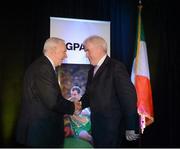 15 November 2012; Donald R. Keough, Chairman of the Board, Allen & Company Incorporated, with Jimmy Deenihan, TD, Minister for Arts, Heritage and the Gaeltacht, after he, Keough, had made his Acceptance Remarks at the Gaelic Players Association Ireland - U.S. Gaelic Heritage Awards & Dinner Gala in his honour. Marriott Marquis New York Westside Ballroom, Broadway,  Times Square, New York, USA. Picture credit: Ray McManus / SPORTSFILE