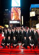15 November 2012; Liam Ó Néill, Uachtarán, Chumann Lúthchleas Gael, with the Sam Maguire Cup, and members of both the 2011 and 2012 GAA GPA All-Star teams gather for a team photograph in  Times Square on their way to the Gaelic Players Association Ireland - U.S. Gaelic Heritage Awards & Dinner Gala at the Marriott Marquis New York Westside Ballroom, Broadway,  Times Square, New York, USA. Picture credit: Ray McManus / SPORTSFILE