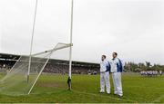 18 November 2012; Umpires Barry McMenamin, left, and Ciaran Brady stand for the National Anthem before the start of the game. AIB Ulster GAA Football Senior Championship Semi-Final, Crossmaglen Rangers, Armagh v Errigal Ciaran, Tyrone, St Tiernach's Park, Clones, Co. Monaghan. Photo by Sportsfile