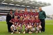 12 August 2012; Anne Fay, President of the I.N.T.O with the Galway hurling team, back row, from left, Paul Rellis, Our Lady of Lourdes N.S., Slieverue, Co. Kilkenny, Darragh Hartley, Glenmore N.S., Glenmore, Co. Kilkenny, Diarmuid Whelan, Scoil Faolain Naofa N.S., Ballyroan, Co. Laois, Darragh Kirwan, St. Corban's Boys, Fairgreen, Naas, Co. Kildare, Padraig Delaney, Scoil Tighearnach, Cullohill, Co. Laois and Pat Monahan. Front row, from left, Cian Staunton, St. Joseph's N.S., Glenealy, Co. Wicklow, Tom Summers, St. Patrick's N.S., Bearnachle, Arklow, Co. Wicklow, Luke Griffin, St. Corban's Boys N.S., Fairgreen, naas, Co. Kildare, James Keyes, Tobar an Leinn N.S., Raheen, Abbeyleix, Co. Laois and John Nolan, Borris Mixed N.S., Borris, Co. Carlow. Croke Park, Dublin. Photo by Sportsfile