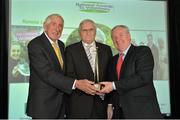 20 November 2012; Minister of State with responsibility for Tourism and Sport Michael Ring TD today honoured ten dedicated volunteers who have made outstanding contributions to sport in Ireland at an awards ceremony which took place at the Aviva Stadium. Pictured is Ronnie Long, from Limerick, receiving his Lifetime Achievement Award, from Michael Ring, T.D, Minister of State at the Department of Tourism and Sport and Irish Olympian Ronnie Delany, left, Chairman of the Selection Committee. 2012 Irish Sport Volunteers Awards, Aviva Stadium, Lansdowne Road, Dublin. Picture credit: Brendan Moran / SPORTSFILE
