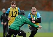 22 November 2012; Ireland's Keith Earls in action against Darren Cave during squad training ahead of their side's Autumn International match against Argentina on Saturday. Ireland Rugby Squad Training, Carton House, Maynooth, Co. Kildare. Picture credit: Matt Browne / SPORTSFILE
