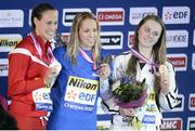 22 November 2012; Sycerika McMahon celebrates with her Bronze medal alongside winner, Petra Chocova, Czech Republic, centre, and second placed Rikke Moller Pedersen, Denmark, after competing in the women's 50m breaststroke final. European Short Course Swimming Championships, Chartres, France. Picture credit: Amandine Noel / SPORTSFILE