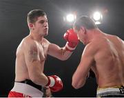 23 November 2012; Joe Ward, British Lionhearts, left, exchanges punches with Imre Szello, Italia Thunder, during their Light Heavyweight 80-85kg bout. World Series of Boxing, British Lionhearts v Italia Thunder, Celtic Manor Resort, Newport, Wales. Picture credit: Steve Pope / SPORTSFILE