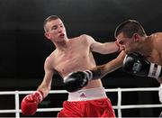 23 November 2012; John Joe Nevin, British Lionhearts, left, exchanges punches with Branimir Stankovic, Italia Thunder, during their Lightweight 57-61kg bout. World Series of Boxing, British Lionhearts v Italia Thunder, Celtic Manor Resort, Newport, Wales. Picture credit: Steve Pope / SPORTSFILE