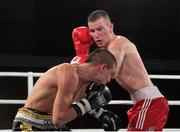 23 November 2012; John Joe Nevin, British Lionhearts, right, exchanges punches with Branimir Stankovic, Italia Thunder, during their Lightweight 57-61kg bout. World Series of Boxing, British Lionhearts v Italia Thunder, Celtic Manor Resort, Newport, Wales. Picture credit: Steve Pope / SPORTSFILE