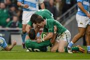 24 November 2012; Jonathan Sexton, Ireland, celebrates after going over to score his side's second try with team-mates Craig Gilroy, right, and Conor Murray. Autumn International, Ireland v Argentina, Aviva Stadium, Lansdowne Road, Dublin. Picture credit: Matt Browne / SPORTSFILE