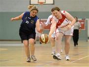 24 November 2012; Grace Hamilton, Antrim Borough Special Olympics Club, in action against, Aisling Beacon, Blue Dolphin Special Olympics Club, Wicklow. 2012 Special Olympics Ireland Women's National Basketball Cup Final, Antrim Borough Special Olympics Club v Blue Dolphin Special Olympics Club, Gormanston College, Co. Meath. Photo by Sportsfile
