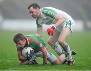 25 November 2012; Damien Kelleher, St Brigid's, in action against David Drake, Ballaghaderreen. AIB Connacht GAA Football Senior Club Championship Final, Ballaghaderreen, Mayo v St Brigid's, Roscommon, Elverys MacHale Park, Castlebar, Co. Mayo. Picture credit: David Maher / SPORTSFILE