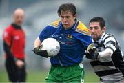 25 November 2012; Daniel Mimnag, Emmet Og Killoe, in action against Craig Rogers, Portlaoise. AIB Leinster GAA Football Senior Championship Semi-Final, Portlaoise, Laois v Emmet Og Killoe, Longford, O'Moore Park, Portlaoise, Co. Laois. Picture credit: Brian Lawless / SPORTSFILE