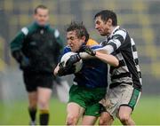 25 November 2012; Daniel Mimnag, Emmet Og Killoe, in action against Craig Rogers, Portlaoise. AIB Leinster GAA Football Senior Championship Semi-Final, Portlaoise, Laois v Emmet Og Killoe, Longford, O'Moore Park, Portlaoise, Co. Laois. Picture credit: Brian Lawless / SPORTSFILE