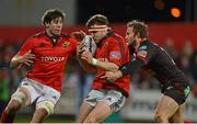 25 November 2012; Mike Sherry, supported by Dave O'Callaghan, Munster, is tackled by Andy Fenby, Scarlets. Celtic League 2012/13, Round 9, Munster v Scarlets, Musgrave Park, Cork. Picture credit: Diarmuid Greene / SPORTSFILE