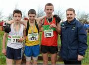 25 November 2012; Christy Conlan, left, who won the Boy's Under 14 3,000m with second place Alan Monaghan, Co. Meath, third place Eoin O'Looney, Kilmurray Ibrickane North Clare A.C., Co. Clare, and President of Athletics Ireland Ciarán Ó Catháin, at the Woodie's DIY Juvenile and Inter County Cross Country Championships. Tattersalls, Ratoath, Co. Meath. Photo by Sportsfile