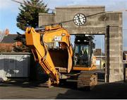 26 November 2012; The digger just makes it under the Memorial Arch as work begins on the redevelopment of Ravenhill. Three new stands will be built at the ground by the summer of 2014, in a phased approach that will see capacity increase from 11,400 to 18,000. The project has received £14.7 million of funding from the Department of Culture, Arts and Leisure and is part of the Northern Ireland Executive's regional stadium development programme. Ravenhill Park, Belfast, Co. Antrim. Picture credit: John Dickson / SPORTSFILE