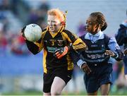 27 November 2012; Aisling Wedick, Scoil Damian Walkinstown, in action against Esther Odekunle, Scoil Archbishop Ryan Balgaddy. Allianz Cumann na mBunscol Finals, Scoil Damian Walkinstown v Scoil Archbishop Ryan Balgaddy. Some 1,200 players took part over the two day finals. Croke Park, Dublin. Picture credit: Brian Lawless / SPORTSFILE