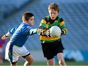 27 November 2012; Jack Loscher, St Patrick’s Hollypark, in action against Sean Murphy, St Oliver Plunkett Malahide. Allianz Cumann na mBunscol Finals, St Oliver Plunkett Malahide v St Patrick’s Hollypark. Some 1,200 players took part over the two day finals. Croke Park, Dublin. Picture credit: Brian Lawless / SPORTSFILE