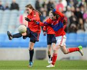 27 November 2012; Roisin McGovern, St Brigid’s Cabinteely, in action against Orla Dunlea, Belgrove GNS Clontarf. Allianz Cumann na mBunscol Finals, St Brigid’s Cabinteely v Belgrove GNS Clontarf. Some 1,200 players took part over the two day finals. Croke Park, Dublin. Picture credit: Brian Lawless / SPORTSFILE
