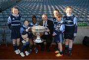 27 November 2012; Liam Ó Néill, Uachtarán, Chumann Lúthchleas Gael, with players from Scoil Archbishop Ryan, Balgaddy, Co. Dublin, and the Sam Maguire Cup during their Allianz Cumann na mBunscol Final. Some 1,200 players took part over the two day finals. Croke Park, Dublin. Picture credit: Ray McManus / SPORTSFILE