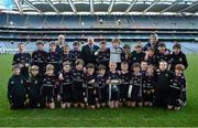 27 November 2012; Liam Ó Néill, Uachtarán, Chumann Lúthchleas Gael, with the Terenure Junior School team after they won the Corn Mhic Chaoilte. Terenure Junior beat Divine Word Marley 1-13 to 2-6 at the Allianz Cumann na mBunscol Finals, Croke Park, Dublin. Some 1,200 players took part in the finals which were played at the GAA headquarters over the last two days. Picture credit: Ray McManus / SPORTSFILE