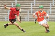 1 July 2012; Mattie Lennon, Armagh, in action against James McGrath, Down. Ulster Minor Hurling Championship Semi Final, Down v Armagh, Casement Park, Belfast, Co. Antrim. Picture credit: Philip Fitzpatrick / SPORTSFILE