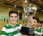 5 December 2012; Daniel Vanzini, Dublin Oak Academy captain, Bray, Co. Wicklow, celebrates with the trophy after victory over Mercy Mounthawk, Tralee, Co. Kerry. FAI All-Ireland Post Primary Schools First Year Futsal Finals, Franciscan College, Sports Centre, Gormanston, Meath. Picture credit: David Maher / SPORTSFILE