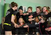 7 December 2012; Chloe Magee, Ireland, who was partnered by her brother Sam, is greeted by 4th class pupils of Bayside Senior National School, Dublin, following her Mixed Doubles Round 1 match against Floris Oleffe and Steffi Annys, Belgium. Irish Open Badminton Championships 2012, Badminton Centre, Baldoyle, Co. Dublin. Picture credit: David Maher / SPORTSFILE