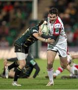7 December 2012; Jared Payne, Ulster, is tackled by Martin Roberts, Northampton Saints. Heineken Cup 2012/13, Pool 4, Round 3, Northampton Saints v Ulster, Franklin's Gardens, Northampton, England. Picture credit: Matt Impey / SPORTSFILE
