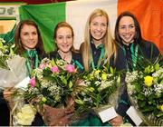 10 December 2012; Team Ireland's, from left to right, Linda Byrne, Fionnuala Britton, Lizzie Lee and Ava Hutchinson who won gold in the European Women's Cross Country Championships Team event at the SPAR European Cross Country Championships, in Budapest, Hungary, pictured on their return at Dublin Airport. Picture credit: David Maher / SPORTSFILE