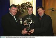 3 March 2003; Eugene Cloonan, Athenry, who was presented with the Connacht AIB GAA Provincial Player Award  by Billy Finn, Managing Director, Ark Life, right, and GAA President Sean McCague at a lunch in his honour in the AIB Bankcentre, Ballsbridge, Dublin. Hurling. Picture credit; Ray McManus / SPORTSFILE