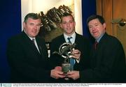 3 March 2003; Ken McGrath, Mount Sion, who was presented with the Munster AIB GAA Provincial Player Award by Billy Finn, Managing Director, Ark Life, right, and GAA President Sean McCague at a lunch in his honour in the AIB Bankcentre, Ballsbridge, Dublin. Hurling. Picture credit; Ray McManus / SPORTSFILE