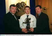 3 March 2003; Gregory O'Kane, Dunloy, who was presented with the Leinster AIB GAA Provincial Player Award by Billy Finn, Managing Director, Ark Life, right, and GAA President Sean McCague at a lunch in his honour in the AIB Bankcentre, Ballsbridge, Dublin. Hurling. Picture credit; Ray McManus / SPORTSFILE