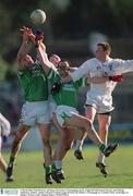 2 March 2003; Paul Brewster and Ryan McCloskey, Fermanagh go up for a high ball with Ronan Sweeney and Padraig Mullarkey, Kildare, Allianz National Football League Division 1B, Kildare v Fermanagh, St. Conleth's Park, Newbridge, Co. Kildare. Picture credit; Damien Eagers / SPORTSFILE