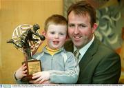 3 March 2003; Colin Corkery, Nemo Rangers, and his four year old son Cormac after Colin was presented with the Munster AIB GAA Provincial Player Award at the AIB Bankcentre, Ballsbridge, Dublin. Football. Picture credit; Ray McManus / SPORTSFILE