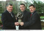 3 March 2003; Eugene Cloonan, Athenry, who was presented with his third Connacht AIB GAA Provincial Player Award  by Billy Finn, Managing Director, Ark Life, right, and GAA President Sean McCague at a lunch in his honour in the AIB Bankcentre, Ballsbridge, Dublin. Hurling. Picture credit; Ray McManus / SPORTSFILE