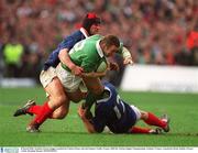 8 March 2003; Ireland's Kevin Maggs is tackled by Fabien Pelous, left and Damien Traille, France. RBS Six Nations Rugby Championship, Ireland v France, Lansdowne Road, Dublin. Picture credit; Brendan Moran / SPORTSFILE