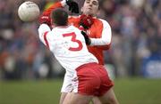 9 March 2003; Martin O'Rourke, Armagh, in action against Colin Holmes, Tyrone. Allianz National Football League, Division 1A, Tyrone v Armagh, Healy Park, Omagh, Co. Tyrone. Picture credit; Damien Eagers / SPORTSFILE *EDI*
