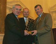 10 March 2003; Sean McCague, right, who was presented with an award for his contribution to the GAA as President by An Taoiseach, Bertie Ahern TD, and Paul Donovan, Chief Executive of Vodafone Ireland. Football. Hurling. Picture credit; Brendan Moran / SPORTSFILE *EDI*
