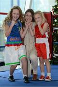 18 December 2012; Olympic gold medallist Katie Taylor with Chantelle Spencer, left, aged 10, and Tiffany Spencer, right, aged 6, from Dublin, at the Bord Gáis Energy Theatre, where she will return to the ring to take on an international opponent on February 24th. Bord Gáis Energy Theatre, Dublin. Picture credit: Barry Cregg / SPORTSFILE
