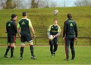 18 December 2012; Munster's Ian Keatley, watched by team-mates, from left, JJ Hanrahan, Niall Ronan and Danny Barnes, in action during squad training ahead of their Celtic League 2012/13 game against Connacht on Saturday. University of Limerick, Limerick. Picture credit: Diarmuid Greene / SPORTSFILE