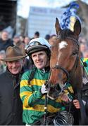 27 December 2012; Jockey Tony McCoy and, racing manager for J.P McManus, Frank Berry celebrate after winning the Paddy Power Steeplechase on Colbert Station. Leopardstown Christmas Racing Festival 2012, Leopardstown Racetrack, Leopardstown, Co. Dublin. Picture credit: Barry Cregg / SPORTSFILE