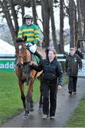 27 December 2012; Colbert Station, with Tony McCoy up, are led into the parade ring by Martha Pisarek after winning the Paddy Power Steeplechase. Leopardstown Christmas Racing Festival 2012, Leopardstown Racetrack, Leopardstown, Co. Dublin. Picture credit: Barry Cregg / SPORTSFILE