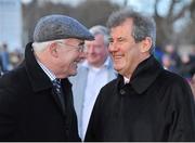 27 December 2012; Trainer Ted Walsh speaking to owner of Colbert Station J.P McManus, right, after Colbert Station won the Paddy Power Steeplechase. Leopardstown Christmas Racing Festival 2012, Leopardstown Racetrack, Leopardstown, Co. Dublin. Picture credit: Barry Cregg / SPORTSFILE