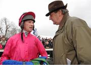 28 December 2012; Winning connections Paul Carberry, jockey, and Noel Meade, trainer, right, in conversation after Monksland won the woodiesdiy.com Christmas Hurdle. Leopardstown Christmas Racing Festival 2012, Leopardstown Racetrack, Leopardstown, Co. Dublin. Picture credit: Pat Murphy / SPORTSFILE