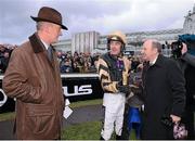 28 December 2012; Winning connections, from left, Willie Mullins, trainer, Ruby Walsh, jockey, and Graham Wylie, owner, in conversation after Back In Focus won the Topaz Novice Steeplechase. Leopardstown Christmas Racing Festival 2012, Leopardstown Racetrack, Leopardstown, Co. Dublin. Picture credit: Pat Murphy / SPORTSFILE