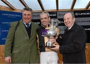 28 December 2012; Jockey Ruby Walsh with owner Graham Wylie, right, and trainer Paul Nicholls after winning the Lexus Steeplechase on Tidal Bay. Leopardstown Christmas Racing Festival 2012, Leopardstown Racetrack, Leopardstown, Co. Dublin. Picture credit: Matt Browne / SPORTSFILE