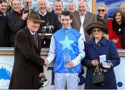 29 December 2012; Jockey Patrick Mullins is congratulated by his father and winning trainer Willie Mullins, and his grandmother Maureen, along with the Supreme Horse Racing Club, after his mount Zuzka won the I.T.B.A Fillies Scheme European Breeders Fund Mares Hurdle. Jockey Patrick Mullins surpassed the previous record, held by Billy Parkinson in 1915, for the most number of winners ridden by an amateur in a calender year in Ireland. Leopardstown Christmas Racing Festival 2012, Leopardstown Racetrack, Leopardstown, Co. Dublin. Picture credit: Pat Murphy / SPORTSFILE