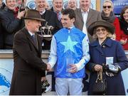 29 December 2012; Jockey Patrick Mullins is congratulated by his father and winning trainer Willie Mullins, and his grandmother Maureen, after his mount Zuzka won the I.T.B.A Fillies Scheme European Breeders Fund Mares Hurdle. Jockey Patrick Mullins surpassed the previous record, held by Billy Parkinson in 1915, for the most number of winners ridden by an amateur in a calender year in Ireland. Leopardstown Christmas Racing Festival 2012, Leopardstown Racetrack, Leopardstown, Co. Dublin. Picture credit: Pat Murphy / SPORTSFILE