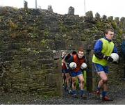 6 January 2013;, Roscommon players Donal Keane, right, and Paul Gleeson make their way from the training pitch to the main pitch before the start of the game. Connacht FBD League, Section B, Roscommon v Leitrim, Elphin GAA Club, Elphin, Co. Roscommon. Picture credit: David Maher / SPORTSFILE